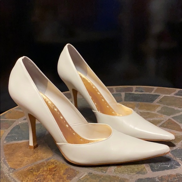 cream leather pumps